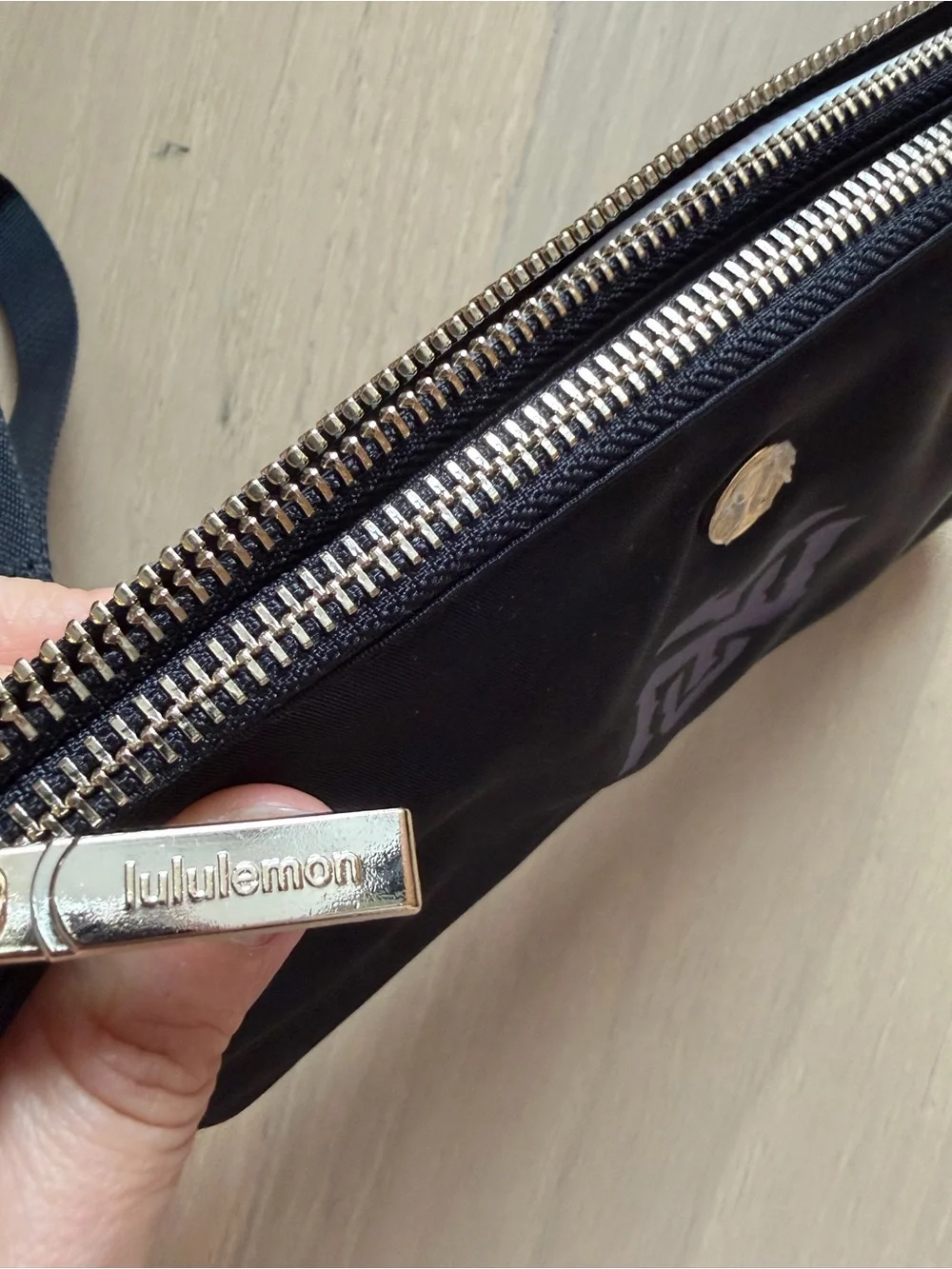 NWT Lululemon Black Wristlet Pouch with NYU logo